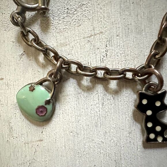 Silver tone enamel charm bracelet - Picture 10 of 12